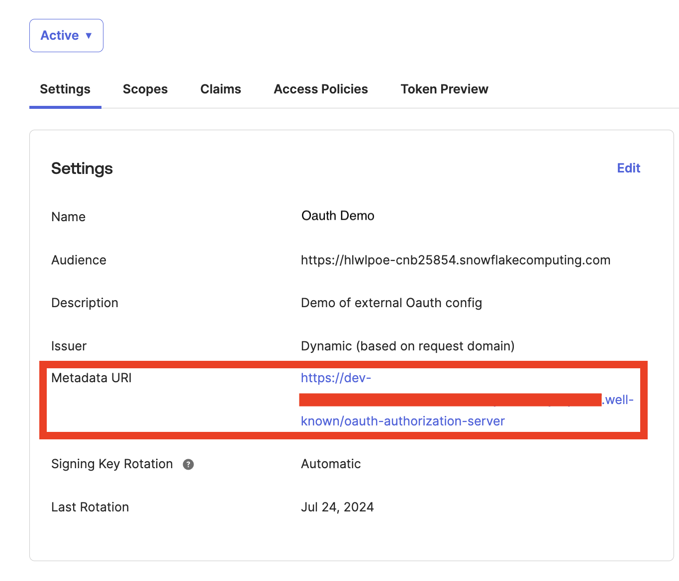 The Okta API settings page with the metadata URI highlighted.